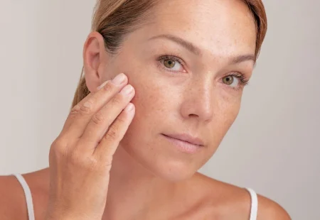 Portrait,Of,Cropped,Caucasian,Middle,Aged,Woman,Face,With,Freckles